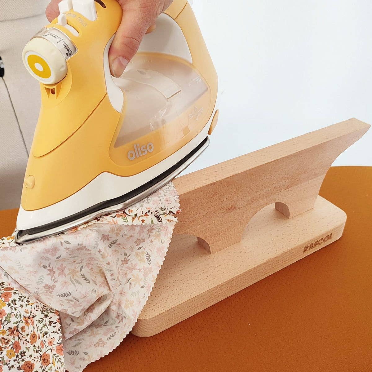 Wooden press for perfect folds