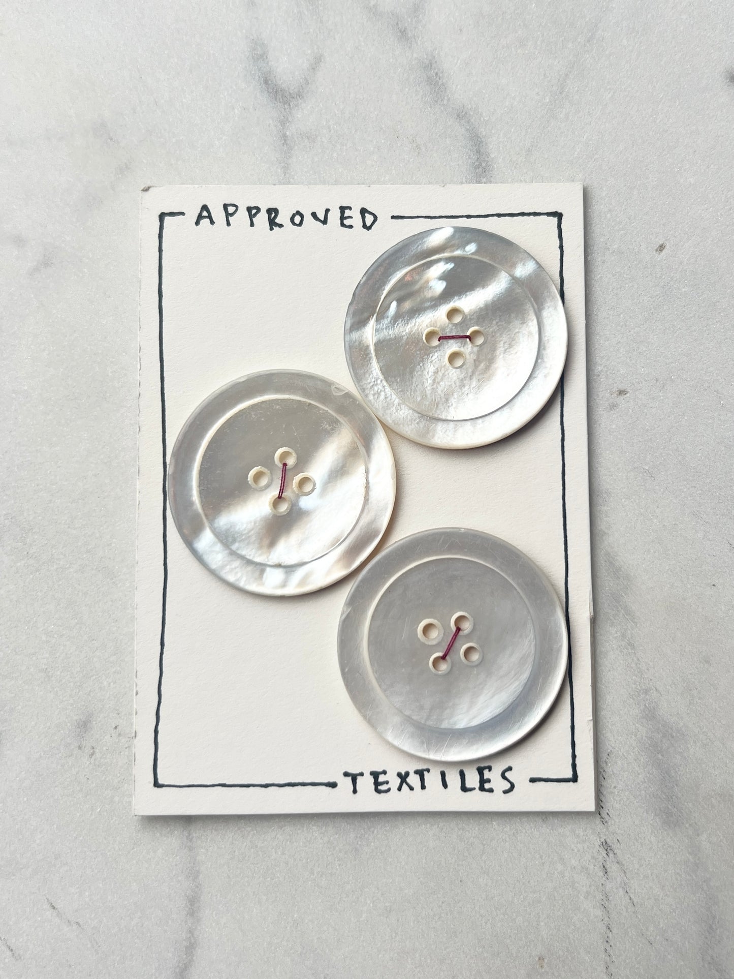 large mother of pearl buttons