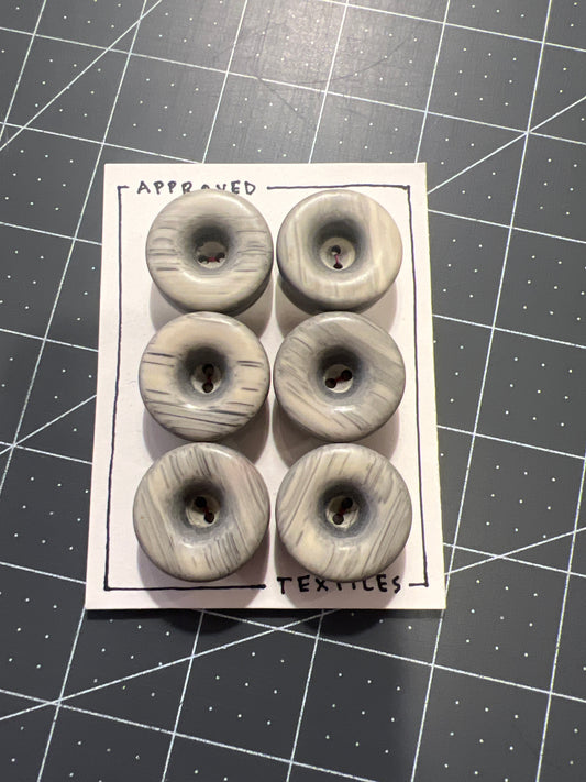 large wood or horn buttons