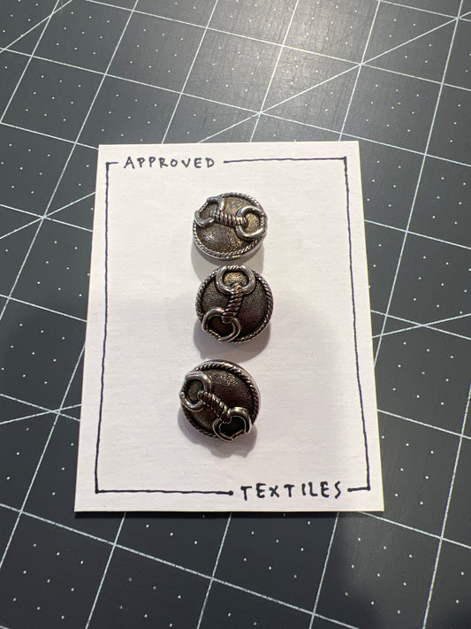 silver metal horse bit buttons