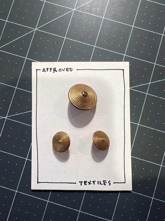 brass stepped circle buttons