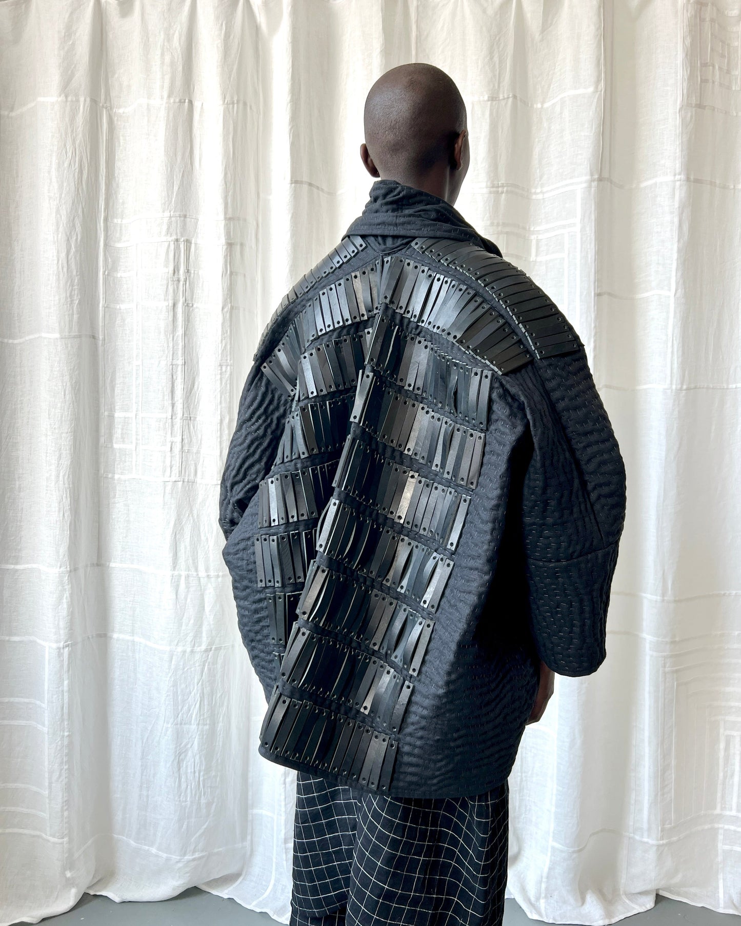 black quilted linen and leather jacket
