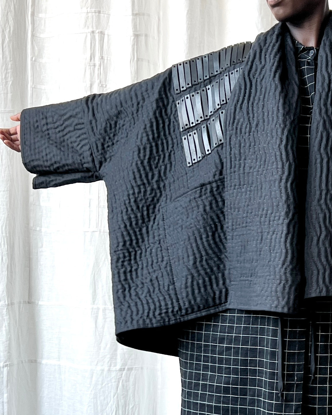 black quilted linen and leather jacket