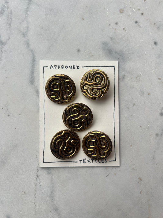brass sculptural coat buttons