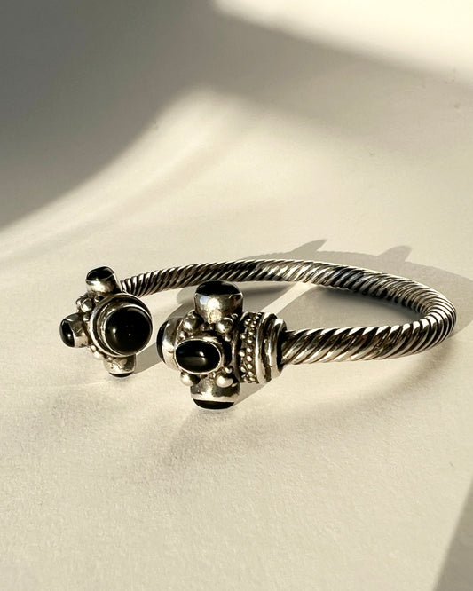 twisted silver bracelet with onyx cabochons