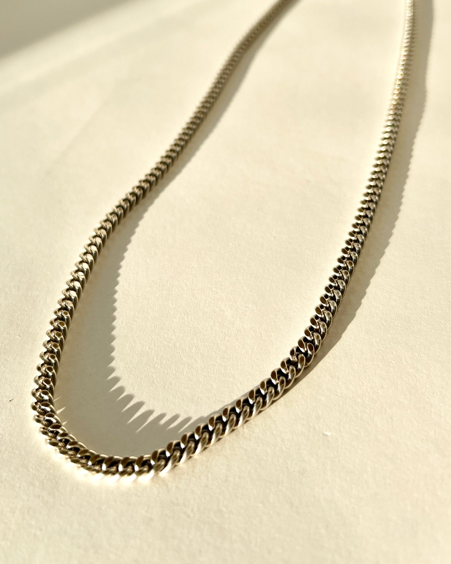 heavy silver chain with S hook closure