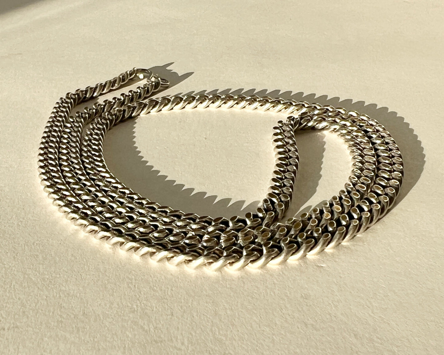 heavy silver chain with S hook closure
