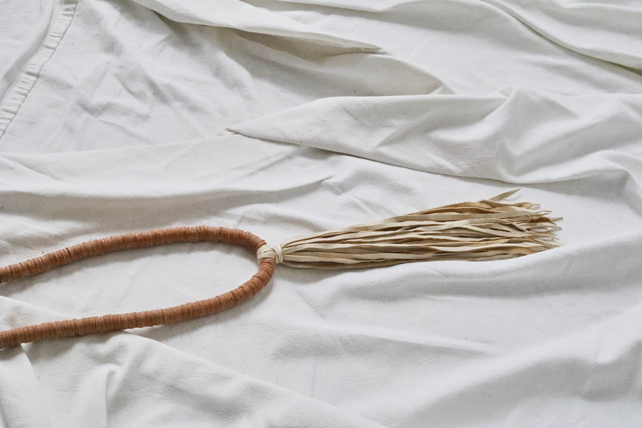 leather sequins with deerskin tassel